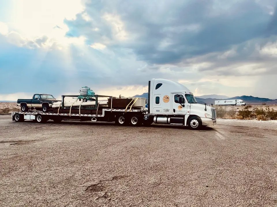 Infiniti Logistics 2.0, LLC truck and loaded trailer